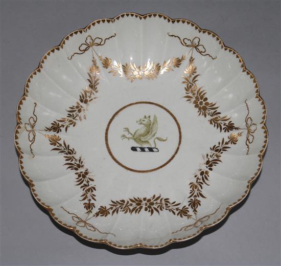 A Worcester gilt swag painted fluted shallow dish, with griffin crest, 8.25in.